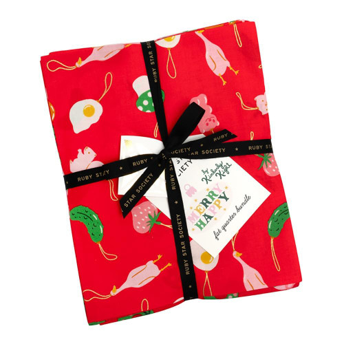 Moda Fabrics Merry Happy Ruby Star Society Kimberly Kight 27 Fat Quarters, a bundle of colorful fabric with holiday-themed designs including pink flamingos, strawberries, and green cucumbers, wrapped with a black ribbon with gold text.