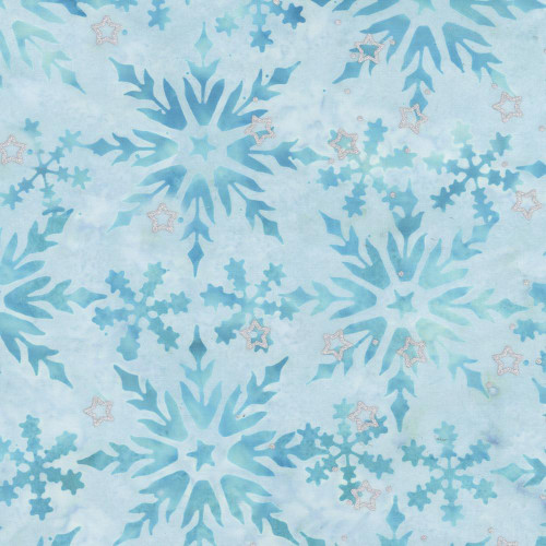 Windham Fabrics Anthology Batiks Jacqueline de Jonge Wonderful Feeling Ice Grey Star of Bethlehem, fabric with a pattern of light blue snowflakes and stars on a pale blue background.