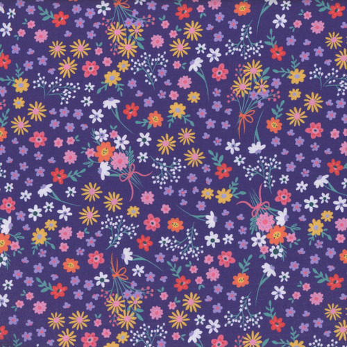 Windham Fabrics Twirling Tutus Whistler Studios Violet Purple Ballet Bouquets, purple fabric with colorful floral patterns including yellow, pink, white, red, and blue flowers, and tied bouquet designs.