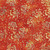 Lumin Fabrics Island Batik Everbloom Batiks Flowers and Dots Multi, fabric with a vibrant orange background adorned with golden floral and dot patterns.