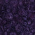 Lumin Fabrics Island Batik Secret Garden Batiks Medium Daisies and Lillies Purple Hyacinth, floral batik fabric with purple and violet tones featuring daisies, lilies, butterflies, and hyacinths.