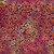 Lumin Fabrics Island Batik Salsa Batiks Petal Flower Multi Red Blue Dusty, a colorful fabric with a vibrant petal and flower pattern in red, blue, and dusty tones.