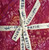 Lumin Fabrics Island Batik Posy Twist Batiks 5 Inch Squares, close-up of the fabric tied with a fabric label.