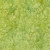 Lumin Fabrics Island Batik Posy Twist Batiks Vines Leaves and Berries Green Pistachio, vibrant green batik fabric featuring a detailed pattern of vines, leaves, and berries.