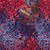 Lumin Fabrics Island Batik Salsa Batiks Petal Flower Purple Pansy, fabric with a colorful purple, pink, and orange abstract floral pattern mesh overlay.