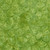 Lumin Fabrics Island Batik Sunflower Spice Batiks Tossed Petals Green Lemongrass, green batik fabric featuring a floral pattern of sunflower petals in various shades of green.