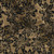 Lumin Fabrics Island Batik Woodland Warmth Batiks Leaves and Berry Clusters Brown Java, fabric with a woodland pattern of black leaves and berry clusters on a textured brown background.