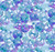 In The Beginning Fabrics Celtic Garden Blue Celtic Stamps, intricate blue and purple Celtic knot and tree patterns in circular and square designs stacked and overlapped.