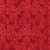 Riley Blake Fabrics Christmas Batiks Express Yourself! Holiday Sparkle Lipstick Red, vibrant red fabric with a swirling holly berry pattern.