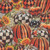 Timeless Treasures Dona Halloween Pumpkin Orange Plaid and Stripe fabric with pumpkin, sunflower, and plaid design.
