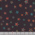 Quilting Treasures Fabrics Santa's Workshop Black Monrovian Stars, black fabric with colorful star patterns.