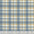 Blank Quilting Fabrics Autumn Vibes Blue Plaid, light blue, beige, white, and yellow checkered fabric pattern.