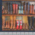 In The Beginning Fabrics Kentucky Tennesse Shop Hop 2025 Tennessee Landmarks Panel, display of various cowboy and leather boots with different colors and designs arranged on wooden shelves.