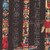 Timeless Treasures Fabrics Northwest Favorites Black Totem Pole, hand-painted Native American-inspired totem pole design on fabric with intricate faces and symbols.