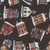 Henry Glass Fabrics Hollyville Manor Black Dickens Village Buildings