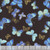 Timeless Treasures Fabrics Escapade Black Flying Metallic Butterflies, fabric featuring blue and gold metallic butterfly pattern on black background.