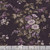Wilmington Prints Fabrics Blackberry Bramble Kaye England Large Floral Black, a fabric with a dark background featuring a large floral pattern in shades of purple, pink, and beige with lush green leaves.