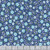 Benartex Fabrics Seaside Garden Shelley Cavanna Beachcomber Cobalt, a floral print fabric with blue, white, and purple flowers and green leaves on a cobalt background.