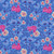 Moda Ruby Star Society Fabrics Hello Alice Sarah Watts Cheshire Cats Flower Vine Lindley Blue - a fabric pattern featuring pink Cheshire cats, white and pink flowers, dark blue vines, and star accents on a blue background.