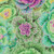 Free Spirit Fabrics Kaffe Fassett Classics Philip Jacobs Moss Brascia, vibrant floral fabric design with colorful leafy and cabbage-like patterns in shades of purple, green, blue, and yellow.