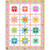 Free Spirit Fabrics Besties Tula Pink Heart Burst Quilt Kit, colorful quilt featuring heart and star patterns in pink, yellow, blue, green, and purple, with a decorative floral border.