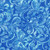 Lumin Fabrics Island Batik Paisley Pop Large Paisley Swirl Blue Powder Blue, fabric with ornate large paisley swirl pattern in shades of blue and powder blue.