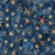 Lumin Fabrics Island Batik Starry Seas Sea Stars Multi Blue Orange, image of blue fabric with a starfish pattern in shades of orange and yellow.