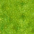 Lumin Fabrics Island Batik Garden Gate Sundial Green Lemongrass, fabric pattern featuring a vibrant green background with abstract, starburst-like motifs in a slightly lighter green shade.