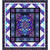 Quilting Treasures Fabrics Royale Dan Morris Flying Carpet Quilt Kit, vibrant stained glass-inspired fabric quilt with intricate floral and geometric patterns in shades of blue, purple, and gold.