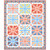 Moda Fabrics Rosie Fig Tree Co For Rosie Jumping Jacks Quilt Kit, colorful patchwork quilt featuring Union Jack designs with floral and geometric patterns in red, blue, green, and white, framed with a floral border.