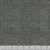 Lumin Fabrics White Owl Textiles Fundamentals Codici Charcoal Grey, textile with a pattern of small dark grey to black dots and floral designs on a charcoal grey background.