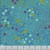 Andover Fabrics Sun Print 2026 Equanimity Pond, fabric with a vibrant pattern of flowers, pods, and abstract shapes in shades of blue, yellow, pink, and white on a teal background.