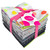 FreeSpirit Fabrics True Colors, a bundle of 17 fat quarters in various colorful polka dot patterns and designs, tied with a pink ribbon.