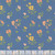 Moda Fabrics Cannon Beach Crystal Manning Lake Blue Astoria Florals, blue fabric with pink and yellow floral pattern.
