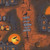 Wilmington Prints Moonlit Manor Lisa Jane Smith Spooky Haunted Houses Black Purple, Halloween-themed fabric with haunted house illustrations, pumpkins, bats, moonlight, and directional signs in a dark orange and black color scheme.