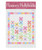 Horace's Hollyhocks Quilt Pattern by Wendy Sheppard, a colorful quilt pattern featuring a floral design with pink, purple, yellow, and orange flowers with green stems and leaves, and a pastel-colored border.