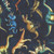 Quilting Treasures Fabrics Savage Kingdom Dan Morris Navy Blue Dinosaurs, a fabric design featuring colorful illustrations of various dinosaurs on a navy blue background.