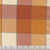 Robert Kaufman Fabrics Mammoth Plaids Rust Flannel Plaid, close-up of a rust-colored plaid fabric with intersecting lines creating a checkered pattern.