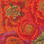 Free Spirit Fabrics Kaffe Fassett 2015 Collective Phillip Jacobs Rust Brassica, fabric with vibrant floral pattern featuring large roses in red, orange, and pink hues with green and purple accents.