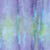 Moda Fabrics Mermaid Batiks Moda Jewel Multi, colorful watercolor-style fabric with shades of purple, blue, green, and pink perfect for quilting and sewing projects.