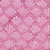 Moda Fabrics Mermaid Batiks Moda Seashell Pink, pink sea shell batik fabric with a dotted pattern.