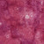 Island Batik Fabrics Sweet Sentiments Patriotic Batiks Geranium Red Pink Ink Splat, pink and red batik fabric with abstract ink splat and circle patterns for quilting and crafts.