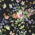 Clothworks Fabrics Sunlit Sonnet 108 Inch Wide Quilt Backing Black Floral Bouquets, black fabric with colorful floral and butterfly pattern.