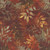 Henry Glass Fabrics Oak and Berries Jan Mott Mixed Media Leaves Autumn, fabric with an autumn-inspired design featuring leaves, berries, and fern patterns in warm earthy tones.