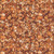 Quilting Treasures Fabrics Lumenique Dan Morris Brown Stained Glass Texture, intricate stained glass pattern with warm brown and amber tones.