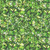 Quilting Treasures Fabrics Lumenique Dan Morris Kelly Green Stained Glass Texture, close-up of a vibrant stained glass pattern with shades of green and black outlines.