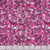 Quilting Treasures Fabrics Lumenique Dan Morris Hot Pink Stained Glass Texture, vibrant pink stained glass fabric with black outlines and irregular geometric shapes.