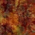 Timeless Treasures Fabrics Tonga Batiks Ember Harvest Brown Stamped Leaves, detailed image of a batik fabric with an intricate pattern of stamped leaves in shades of brown, orange, and hints of green and gold.