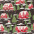 Moda Fabrics Holiday Cheer Stacy Iest Hsu Cardinals Village Scenic Midnight Black, festive holiday-themed fabric with red houses, green pine trees, snow, candy canes, a snowman, and Christmas decorations on a black background.