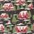 Moda Fabrics Holiday Cheer Stacy Iest Hsu Cardinals Village Scenic Midnight Black, a festive fabric pattern with red houses, snow-covered trees, a snowman, Christmas tree, candy canes, and snowflakes on a black background.